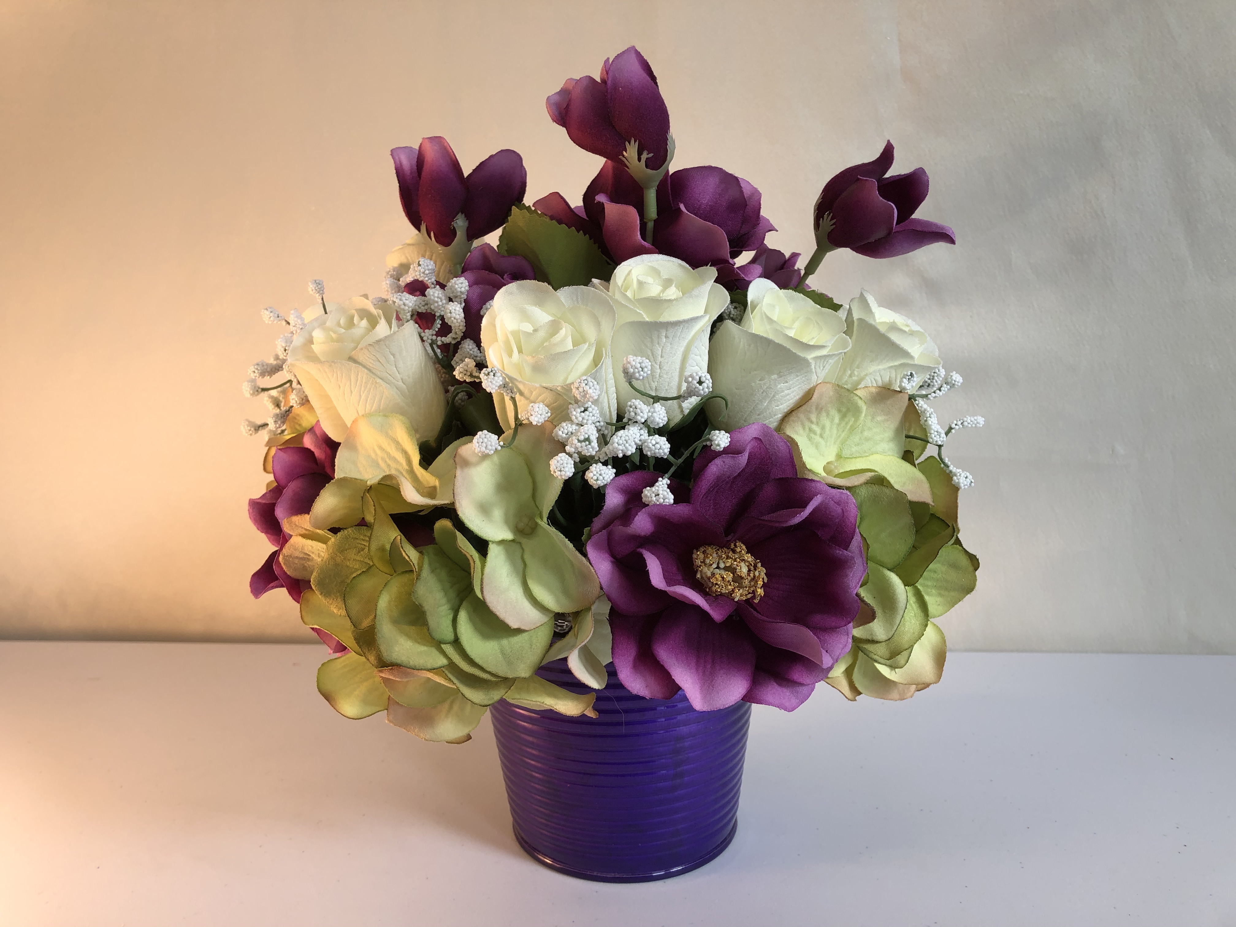 11"H x 11"W Silk Hydranghea and Rose Arrangement, Purple Tin Bucket with Beaded Trim.