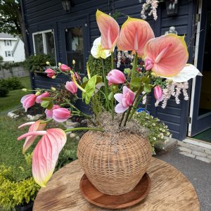 Faux Real Touch Exotic Flower Arrangement in Wicker Basket